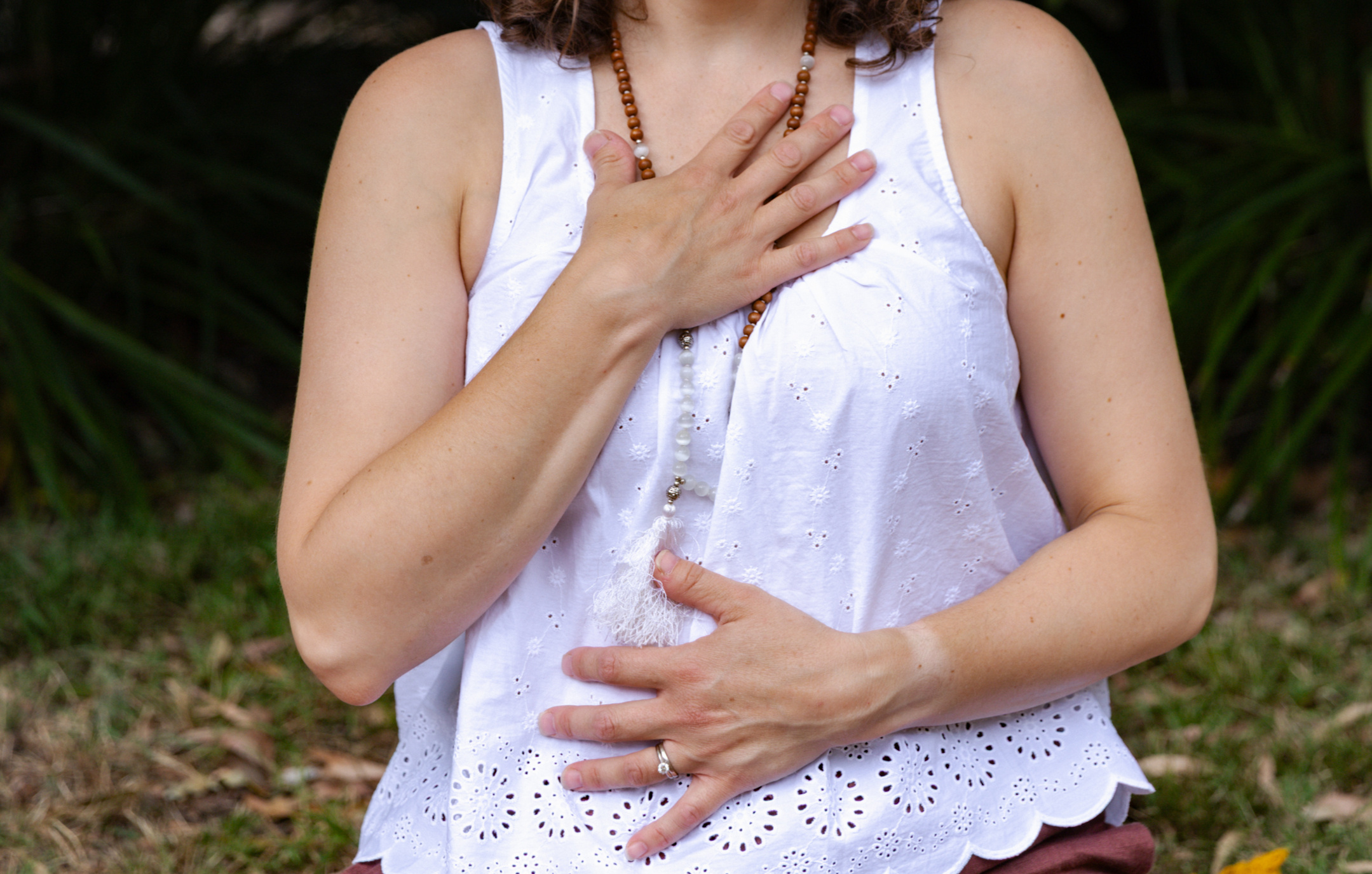 Hands on heart grounding meditation pose at Beautiful Yoga sound circle in Melbourne
