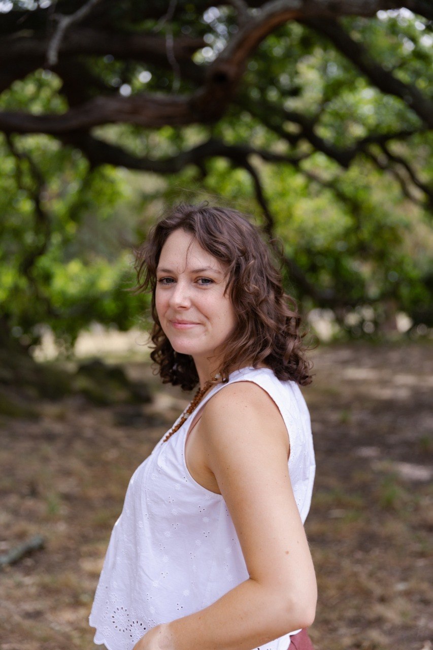 Erin in a portrait for the Meet Erin section of Beautiful Yoga